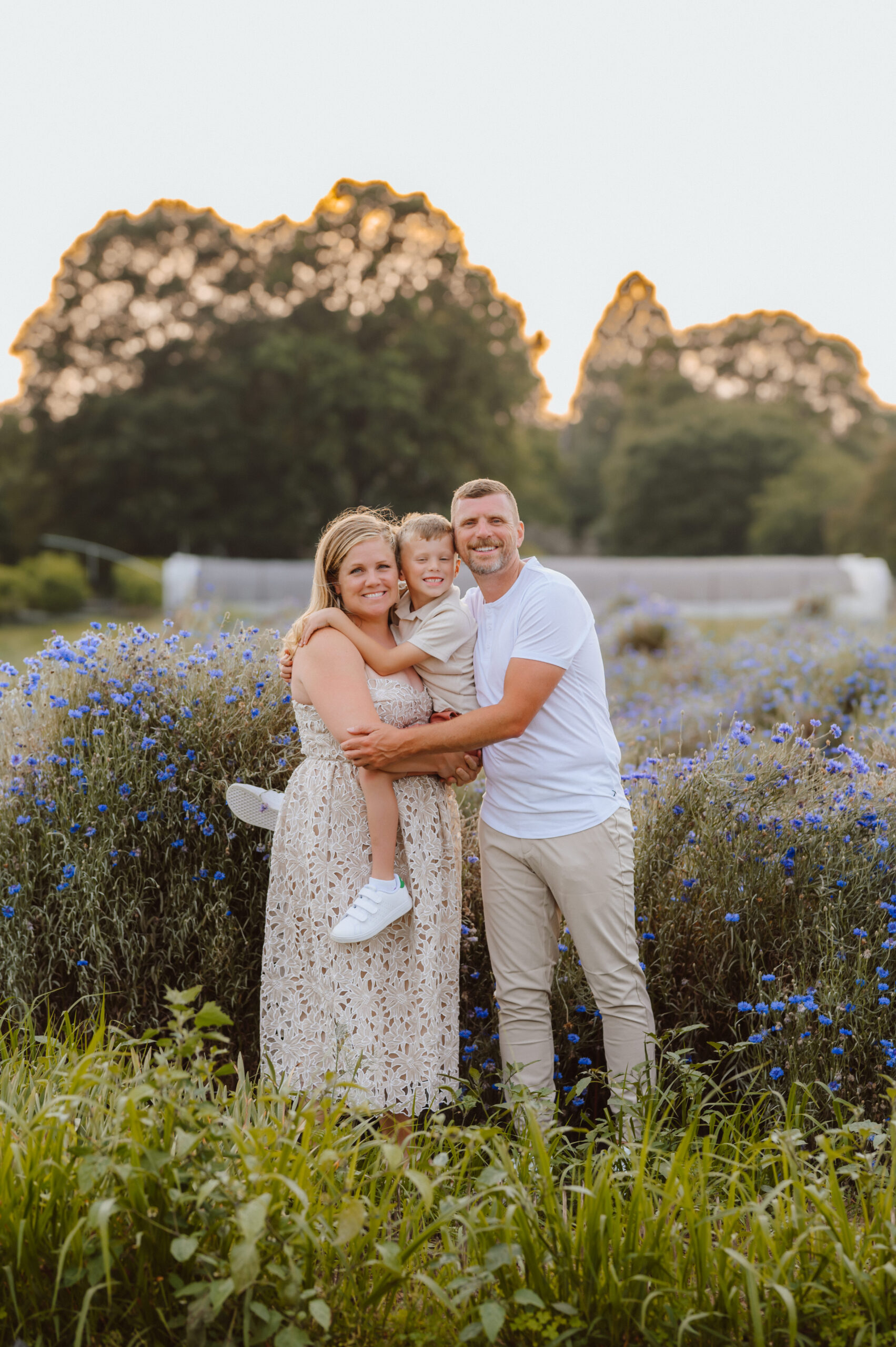 family of 3 in a flower field maryland