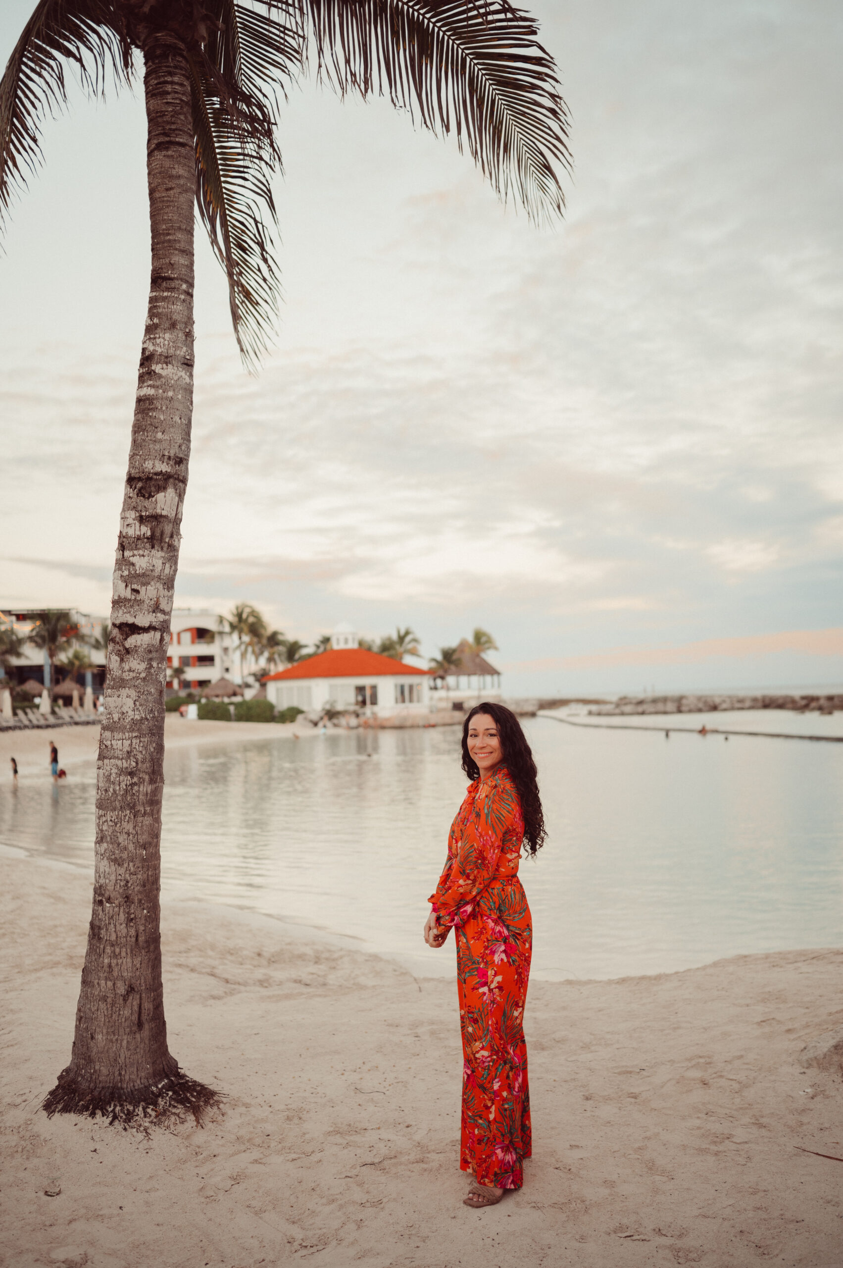 Photo of photographer standing on a beach in Mexio