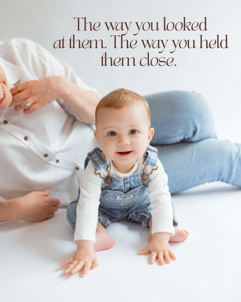 baby leans forward and smiles at camera